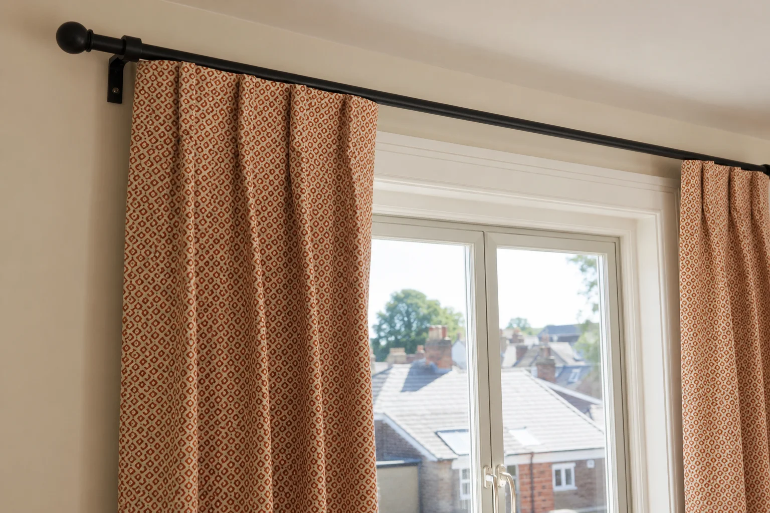 Burnt-Orange Geometric Curtains by Window