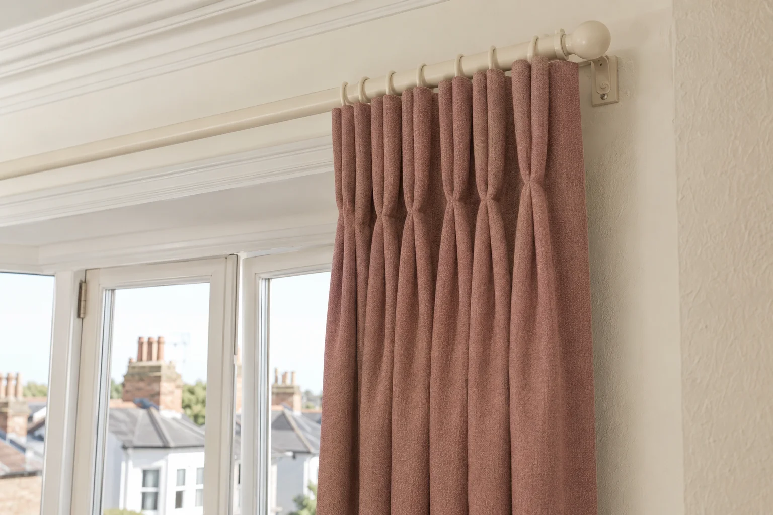 Dusty-rose triple pinch pleat curtains