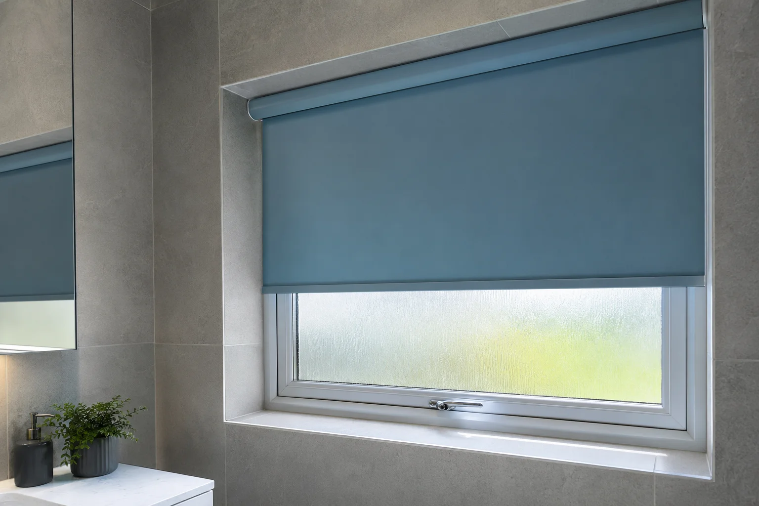 Sea-blue roller blind in modern bathroom